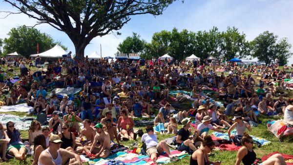 People sitting on blankets in the grass at Hinterland